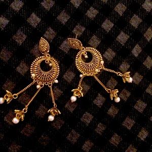 Indian oxidized gold pear earrings.